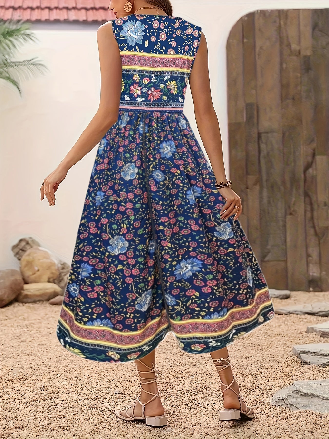 Fabrizia – Ärmelloses A-Linien-Kleid mit Blumenprint und Rundhalsausschnitt Blaues Meer 1