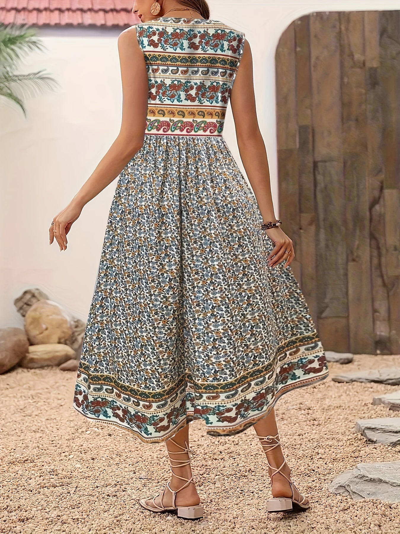 Fabrizia – Ärmelloses A-Linien-Kleid mit Blumenprint und Rundhalsausschnitt Ingwerfarben 1