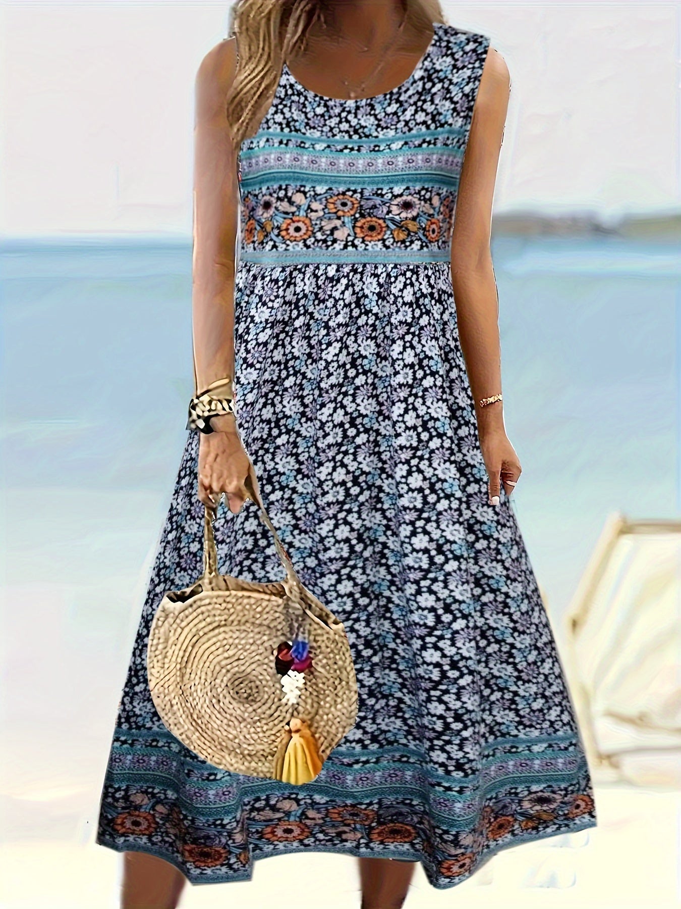 Fabrizia – Ärmelloses A-Linien-Kleid mit Blumenprint und Rundhalsausschnitt Blau