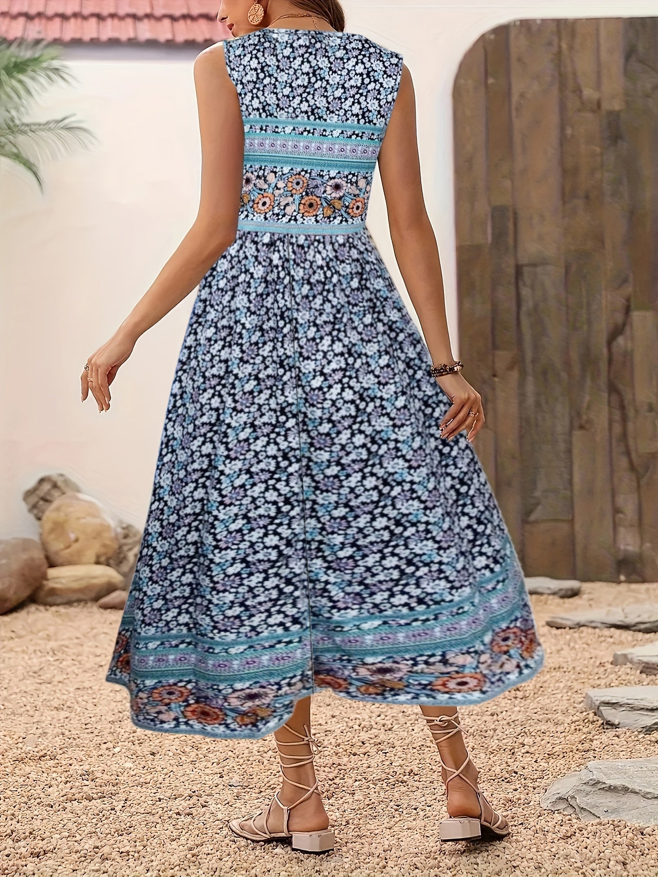 Fabrizia – Ärmelloses A-Linien-Kleid mit Blumenprint und Rundhalsausschnitt Blau 1