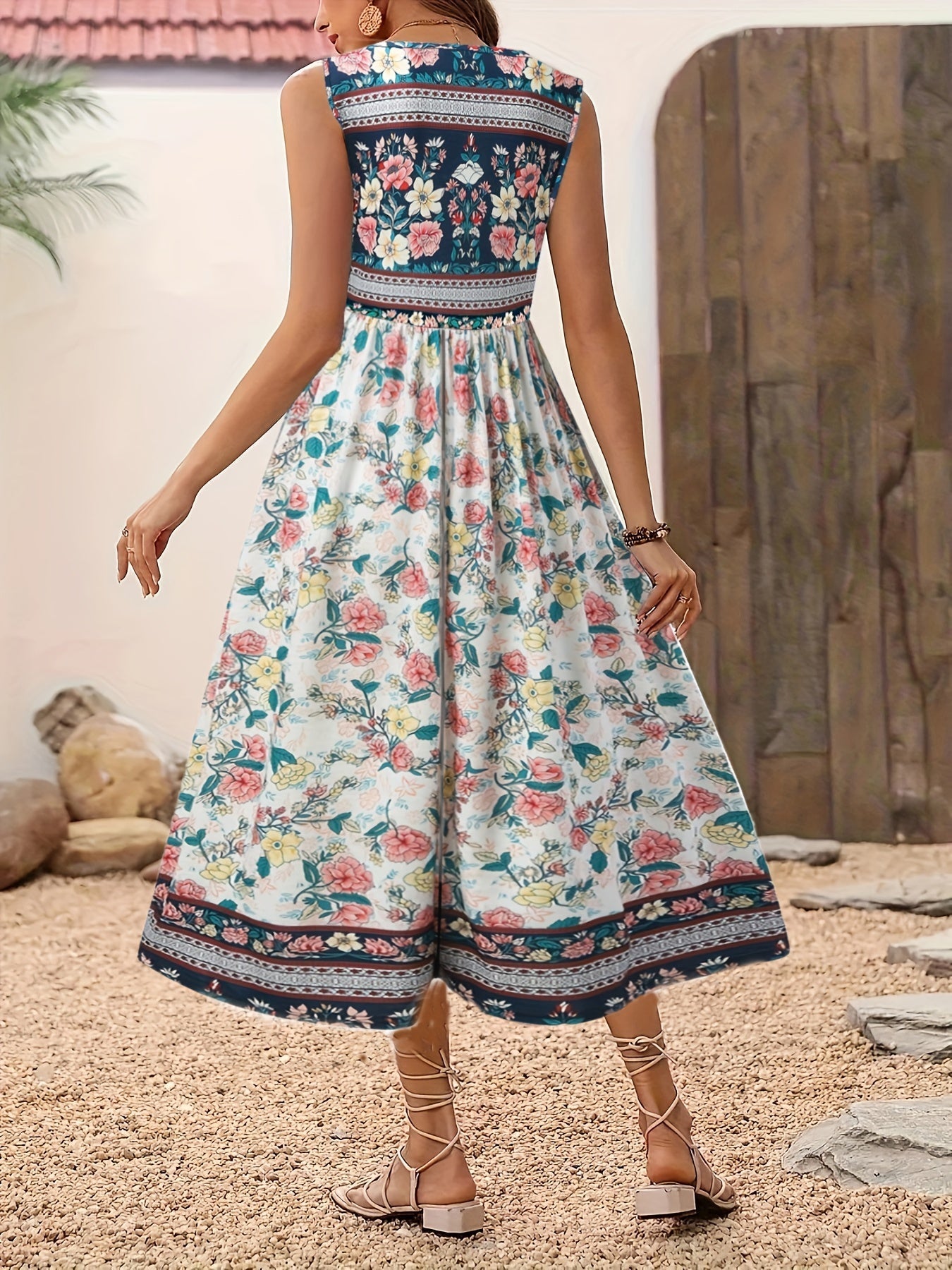 Fabrizia – Ärmelloses A-Linien-Kleid mit Blumenprint und Rundhalsausschnitt Blaues Weib 1