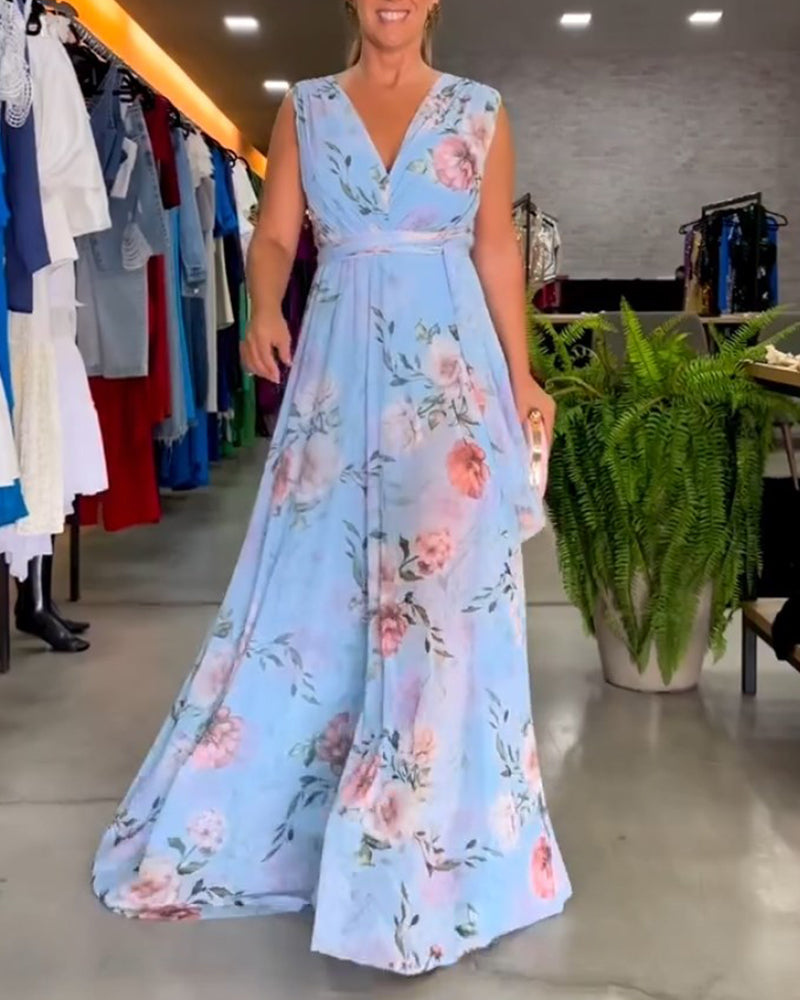 Valesita - Elegantes, ärmelloses Kleid mit Blumendruck und V-Ausschnitt Blau