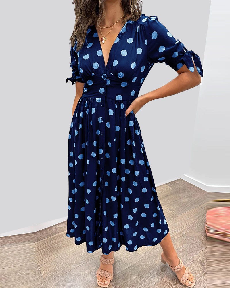 Viorica - Kleid mit tiefem V-Ausschnitt und Tupfen Blau