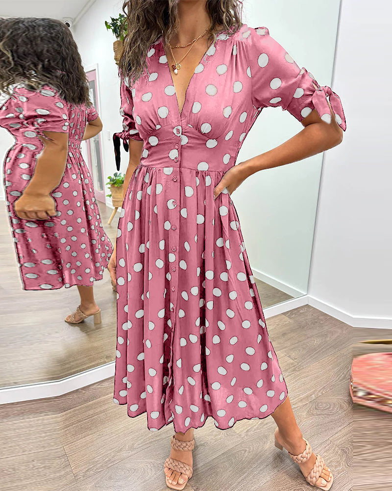 Viorica - Kleid mit tiefem V-Ausschnitt und Tupfen Rose