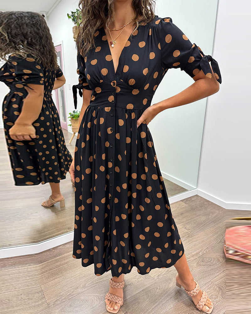 Viorica - Kleid mit tiefem V-Ausschnitt und Tupfen Schwarz